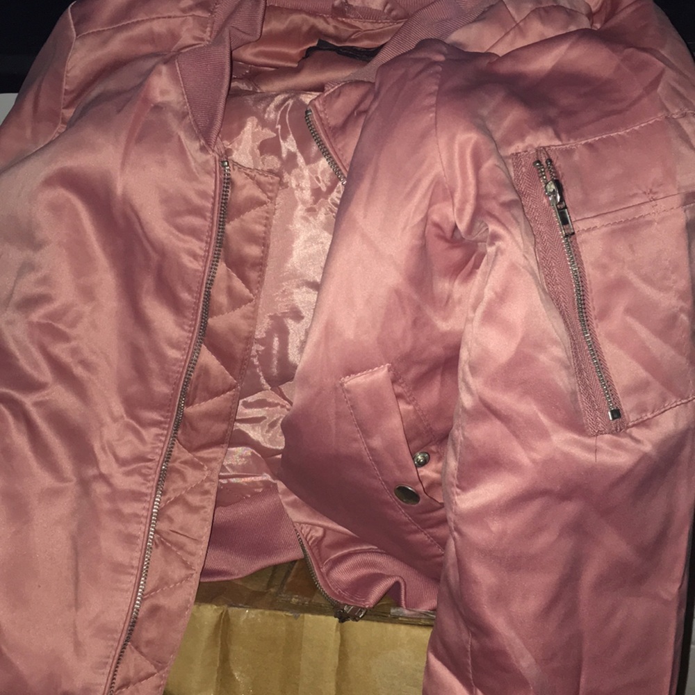 I am selling a pink bomber jacket